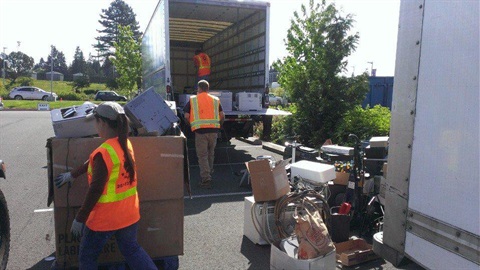 Recycling Collection event with boxes to be loaded onto a truck