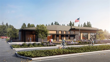 In this rendering, a person rides a bicycle past the 11,975 square-foot facility.