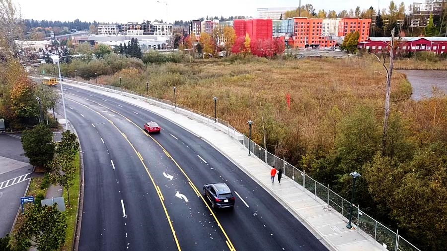 An aerial view of Totem Lake Boulevard reveals two of the Totem Lake Gateway's most prominent features: a rebuilt roadway and an 11-foot-wide sidewalk. 