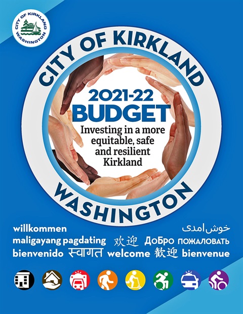 Artistic graphic featuring a multiracial circle of hands around the words 2021-22 Budget against a blue background