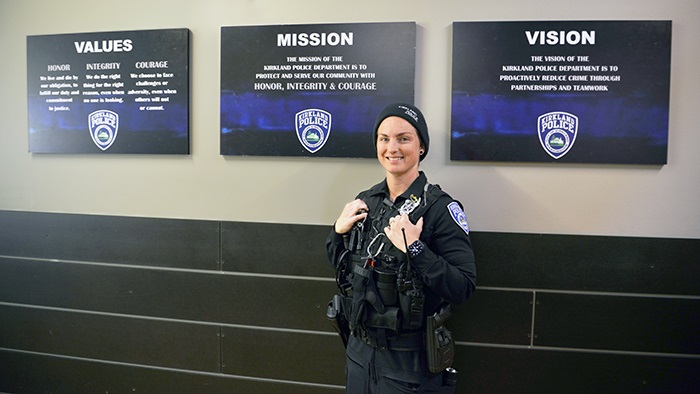 Police Officer with values signs.jpg