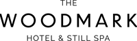 Woodmark Hotel and Still Spa logo