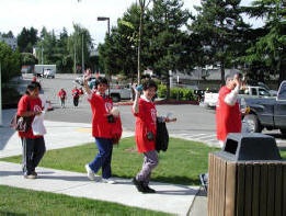 Group of Chinese adults walking.