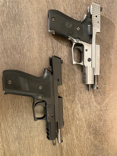 Image of two unloaded handguns