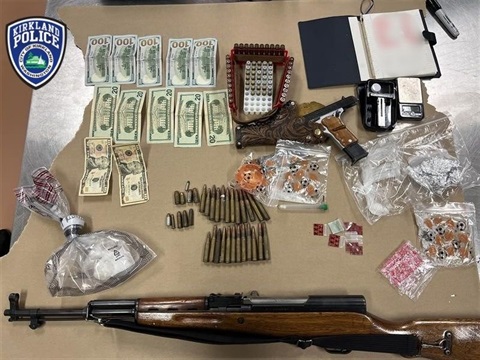 Image-of-guns-drugs-and-money-seized-during-an-arrest-by-Kirkland-Police-Officers.jpg